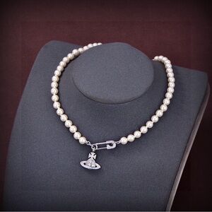 Vivienne Westwood Cream Pearl Necklace with Silver Orb Pendant